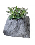 Planter boxes and pots for flowers made of artificial stone